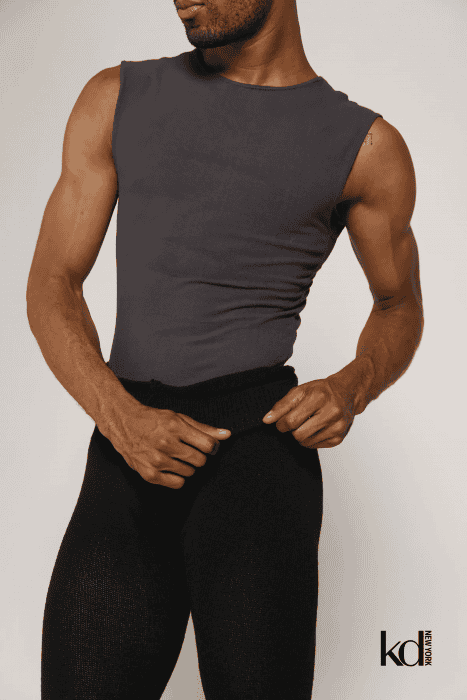 Person wearing a sleeveless T shirt